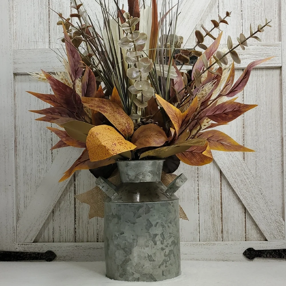 Metal Milk Can with Floral Arrangement Burlap Bow Cattails Dried Lotus